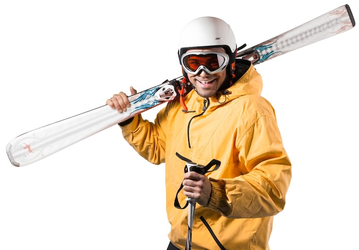 Fotografie handsome young man wearing skiing suit on white