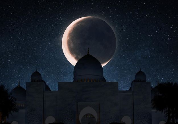 Happy Ramadan Kareem Background Design With Silhouette Mosque and Crescent Moon Mosque Arabian at night on the starry sky with a big moon