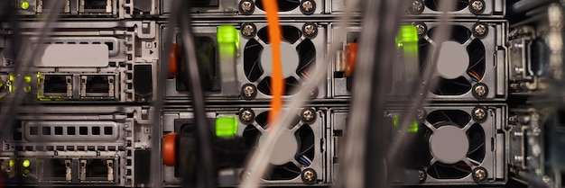 header image of multi colored wired telecommunications server rack