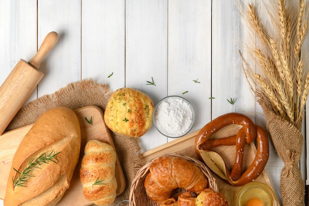 High angle view of breads with ingredients on table