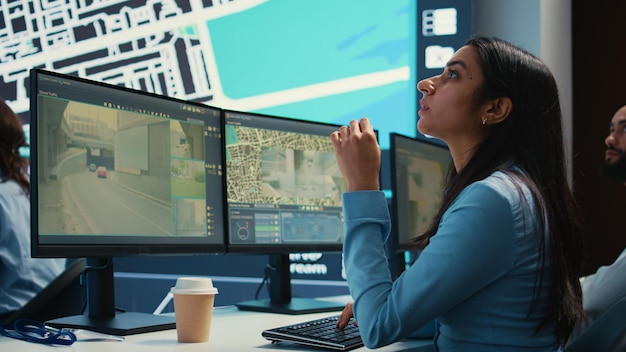 indian operator transmitting gps coordinates for couriers to deliver orders