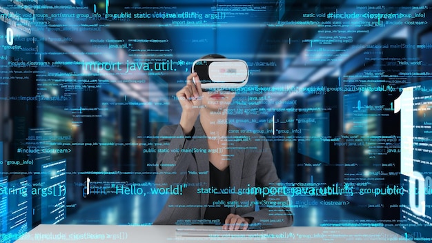 IT developer typing computer code for analyzing intelligent by VR Contraption