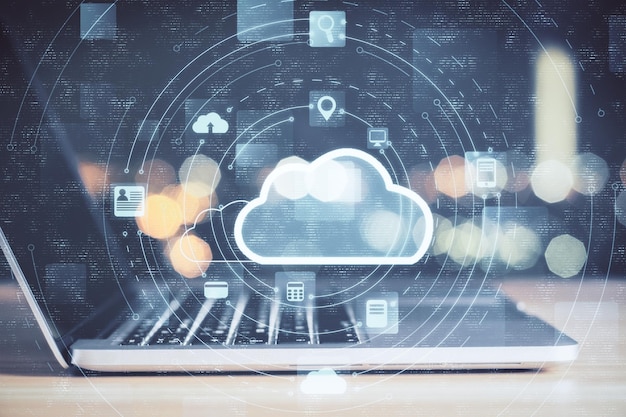 Laptop with cloud computing diagram