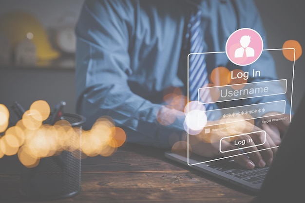 login system by username and password for protecting private data protect the security of the database businessman using a laptop for login private by username and password