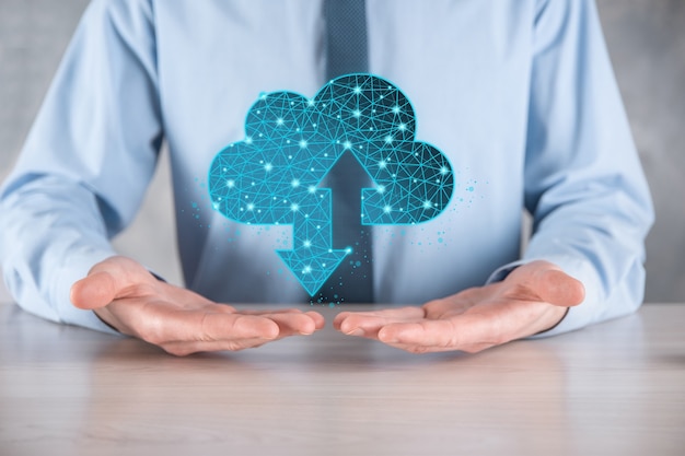 Man hold Cloud icon technology. Polygonal wireframe cloud storage sign with two arrows up and down. Cloud computing, big data center, future infrastructure, digital ai concept. Virtual hosting symbol
