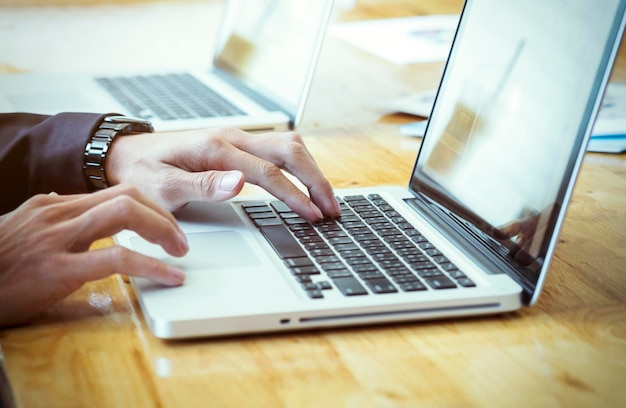 Man using laptop in office