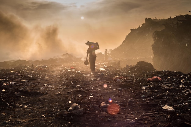 man walking at landfill