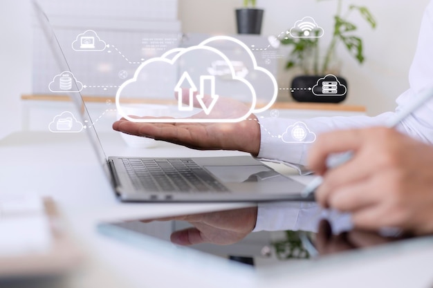 Man with cloud computing diagram show on hand Cloud technology Data storage Networking and internet service concept