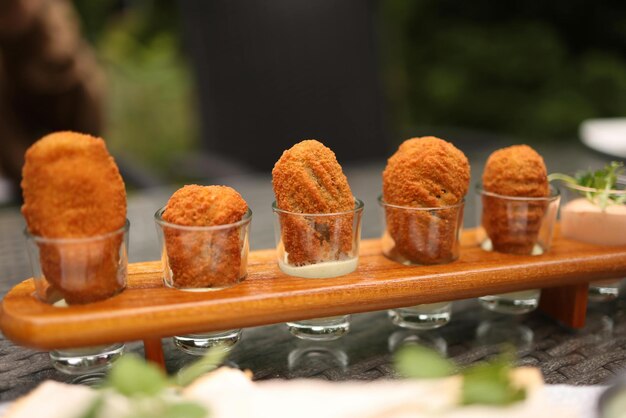 Meat in Cups on Tray Photo