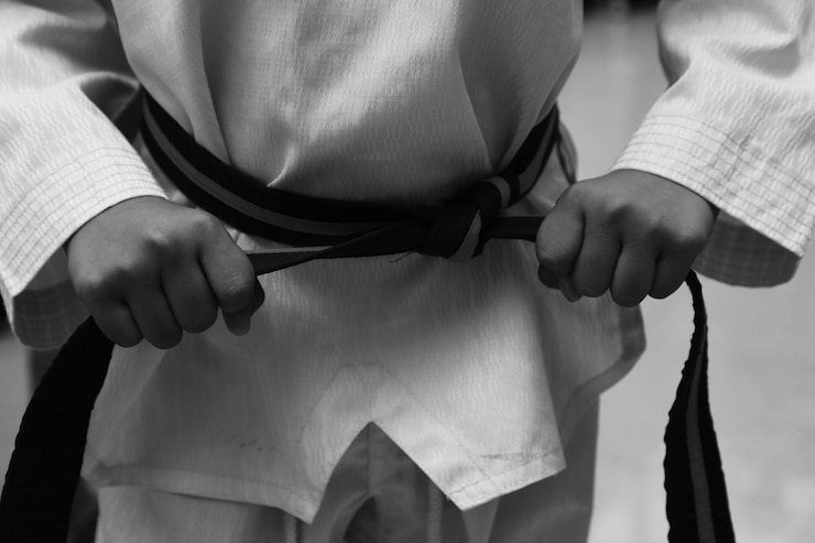 Fotografie midsection of man taekwondo belt