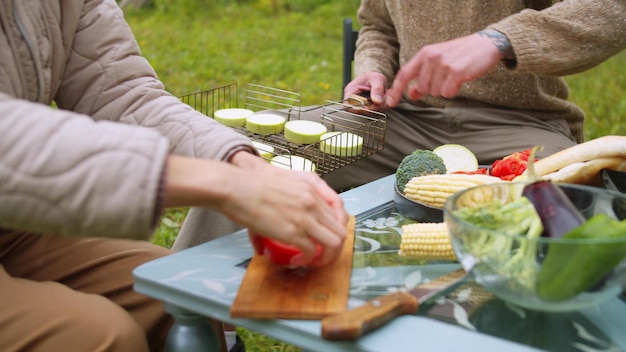 Midsection of woman preparing food at table