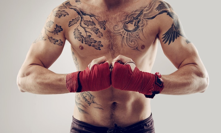 Fotografie mma fist and wraps for male fighter in martial arts boxing and angry on white background hands athlete and exercise for man kickboxer studio and training for impact sports competition or fitness
