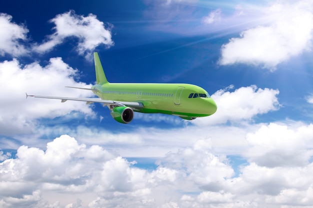 Modern airplane in a sky with clouds.