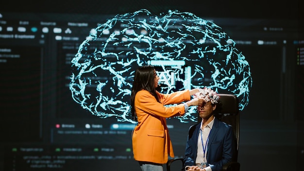 neuroscientist does demonstration at ai forum in front of businessmen