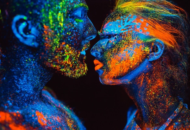 pair of lovers painted in fluorescent powder