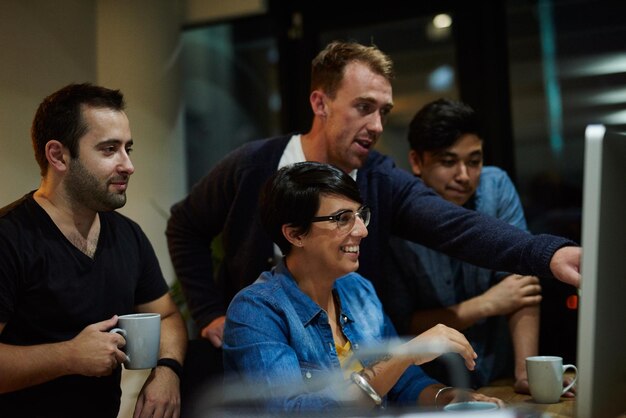 people computer and collaboration at night for planning information technology and pointing with diversity research programming and teamwork for problem solving software development and project
