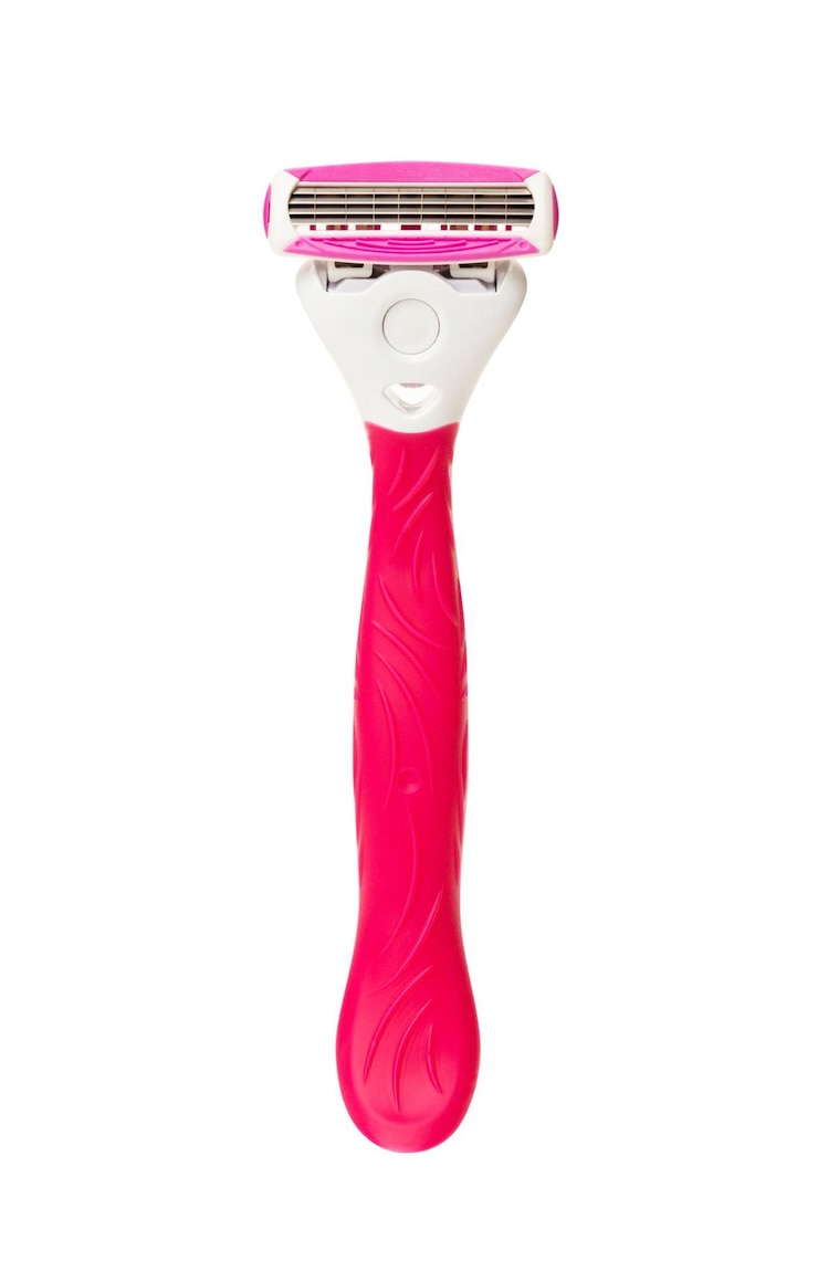 Fotografie pink woman razor with clipping path