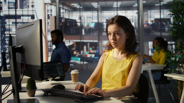 portrait of smiling programmer creating machine learning models