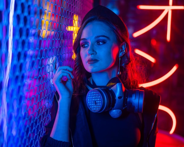portrait of young woman with camera