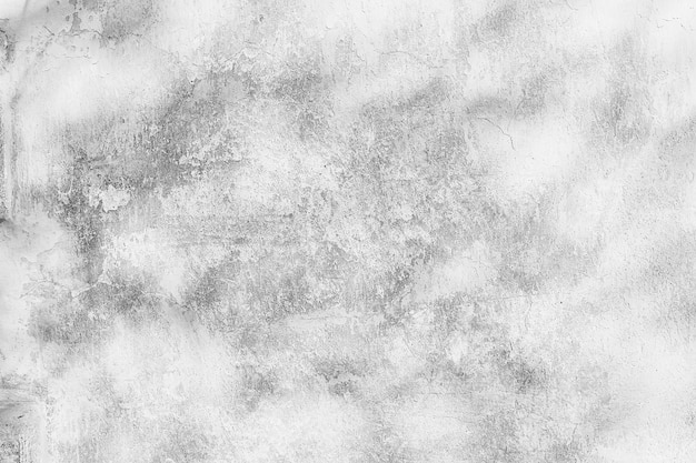 Pozadí s prasklinami na bílé zdi / abstraktní bílé vintage pozadí, texturovaná stará zeď s prasklinami