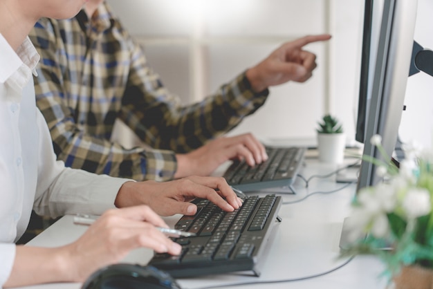 programmers developing codes on their computers