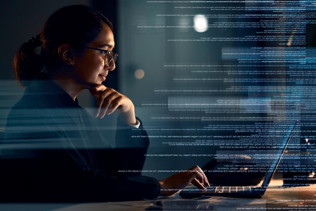 programming coding and thinking with woman at laptop with hologram overlay for software idea and digital at night data analytics technology and future with employee for media database and matrix