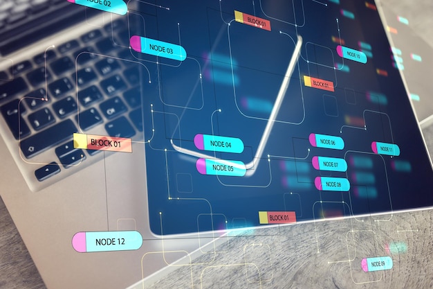 programming concept with mobile gadgets and laptop and digital node tree screen
