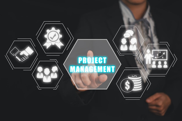 Project management concept Businesswoman hand touching project management icon on virtual screen