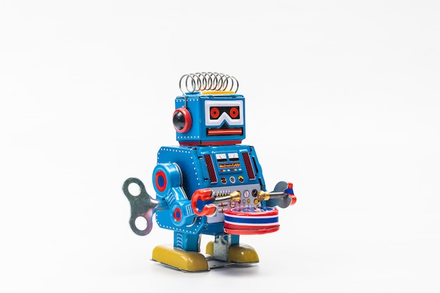 Robot tin toy on white background