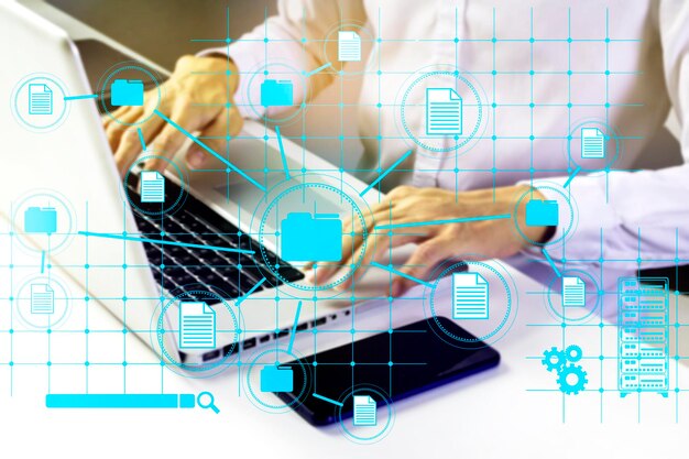 Searching for document information and linking business informationCollecting and sending data to the serverBusinessman managing documents within the company