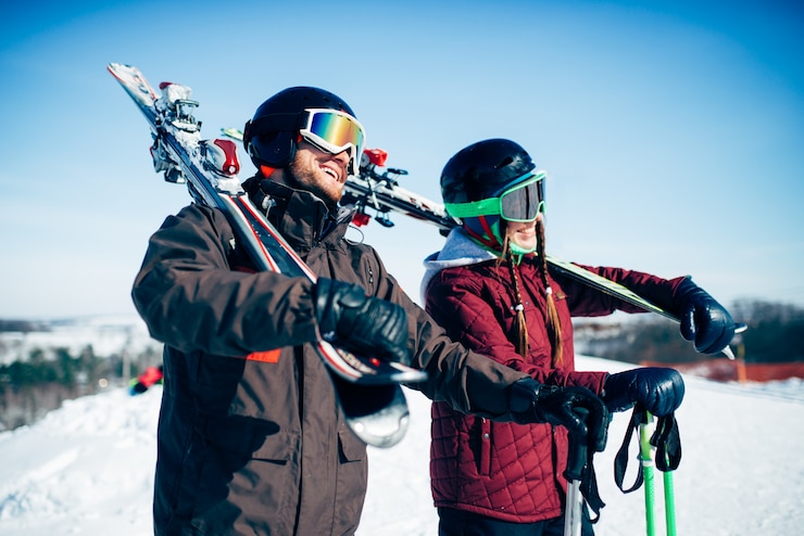 Fotografie skiers with skis and poles, extreme lifestyle