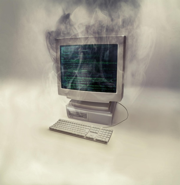 smoke computer problem and monitor with desktop and error screen with explosion isolated white background and technology fail from pc virus old cyber malware burnout and tech system glitch