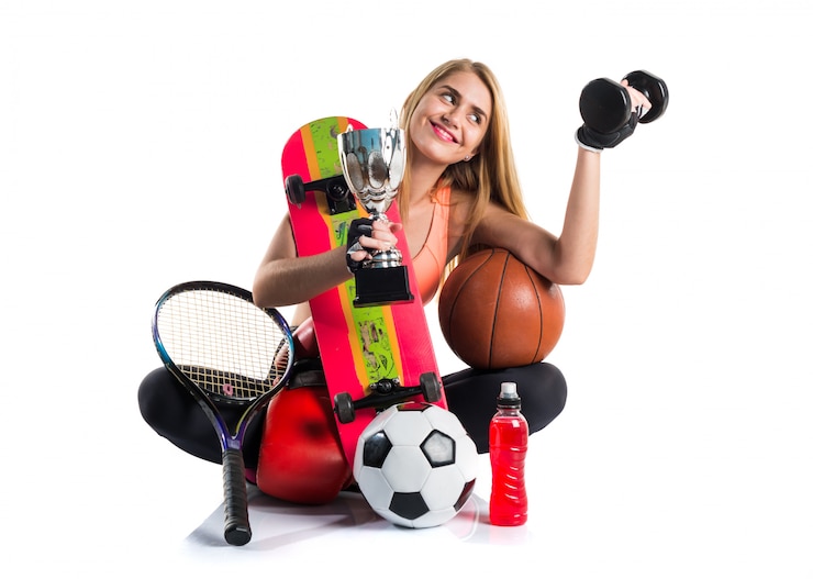 Fotografie sport girl with a lot of sport items