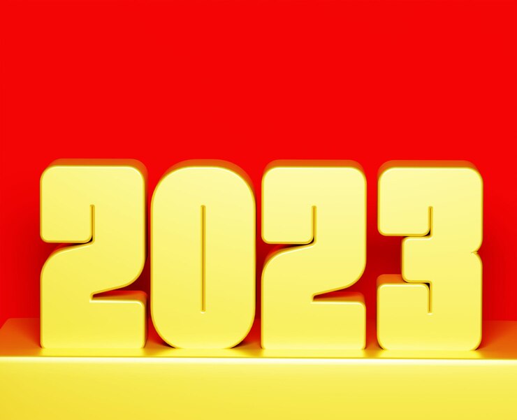Fotografie šťastný nový rok 2023 přání ve zlaté barvě na červeném pozadí banneru