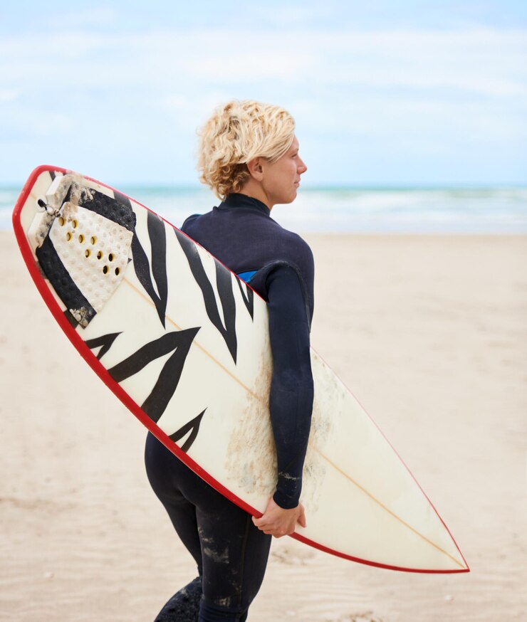 Fotografie surfer board and back for thinking at beach training or fitness on vacation in summer with workout person surfboard and sport for wellness health and ideas by ocean waves or freedom on holiday