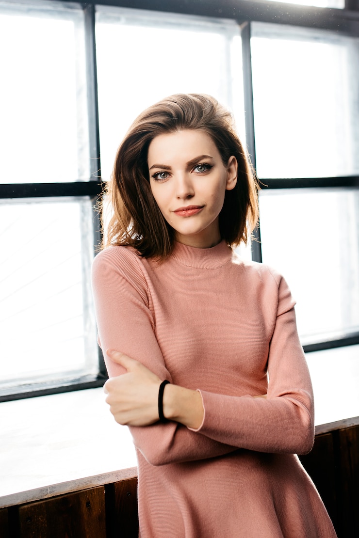 Fotografie the beautiful girl in a pink dress