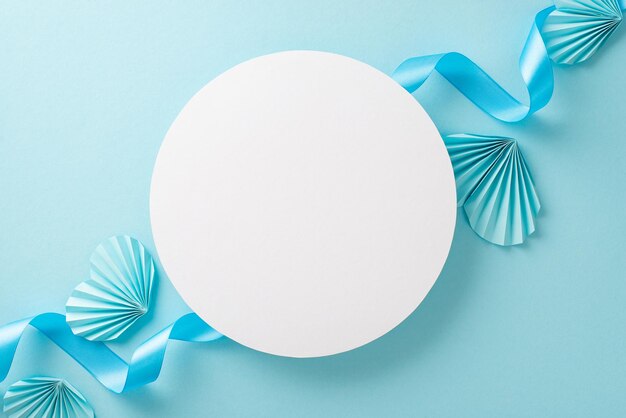 Top view photo of white empty circle with a pastel blue ribbon and origami paper hearts on an isolated light blue background with copyspace