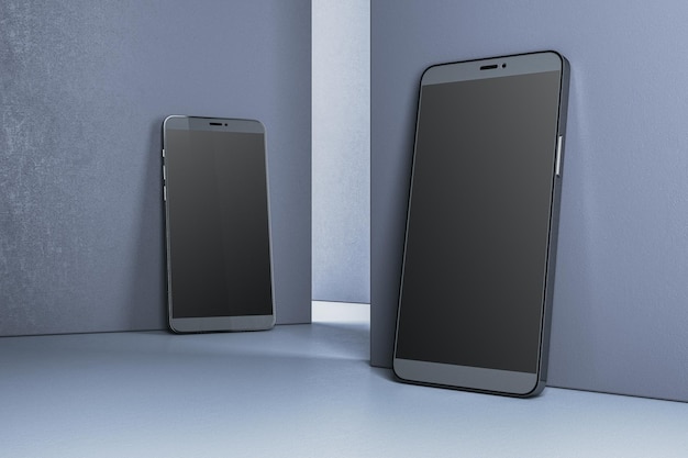 Two modern smartphones with blank screens leaning against wall on a blue surface 3D Rendering