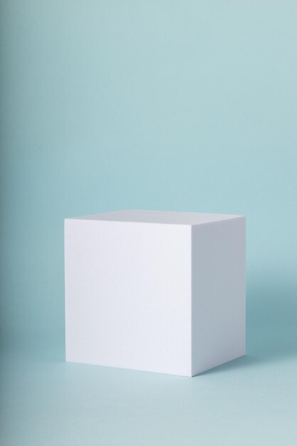 White cube on blue background Minimal mock up for your products