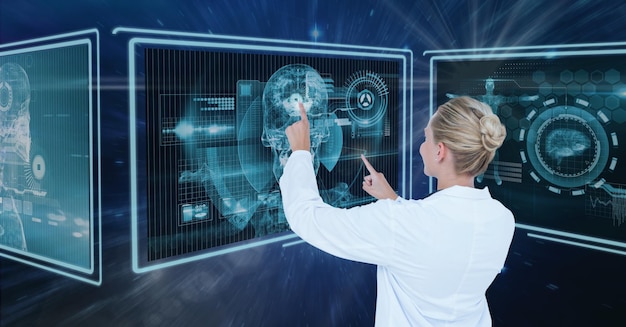 woman doctor interacting with medical interfaces