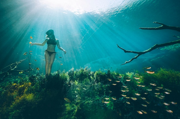 Woman swimming underwater