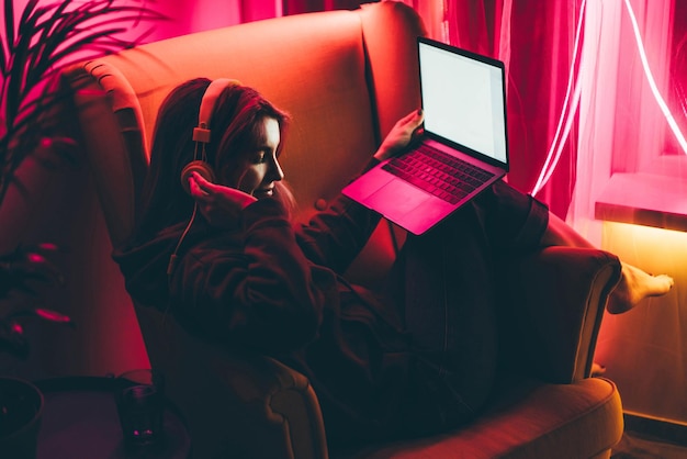 woman using laptop at home