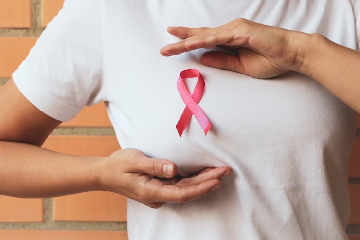 Fotografie woman with pink awareness ribbon