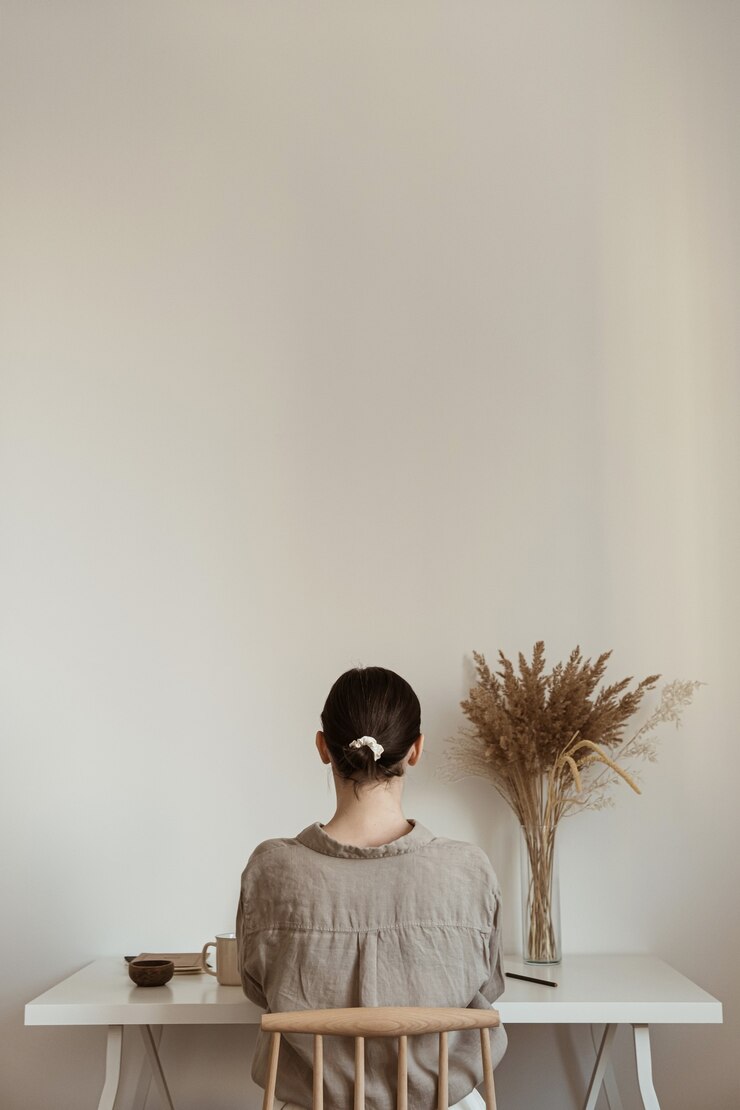 Fotografie working at home concept. girl working at home. modern home living room interior design