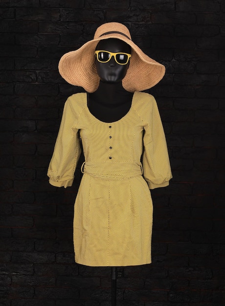 yellow short dress on a mannequin