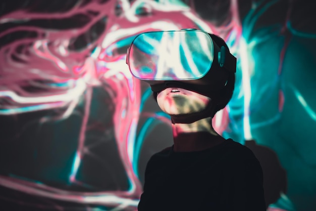 young girl surprised during the virtual reality experience at home