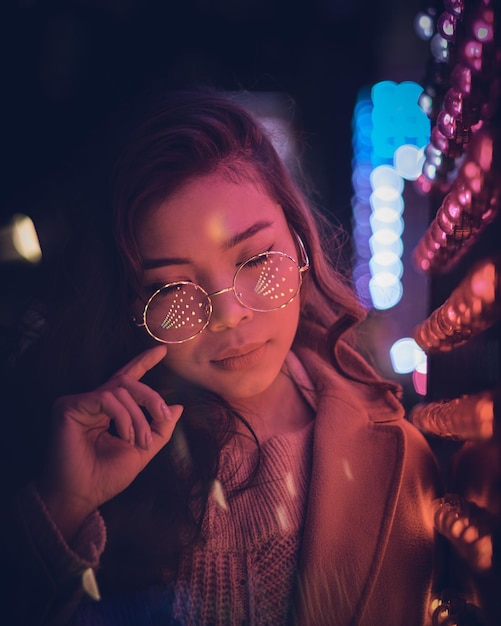 young woman in nightclub seen through glass