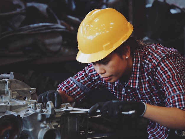 Young woman working at industry