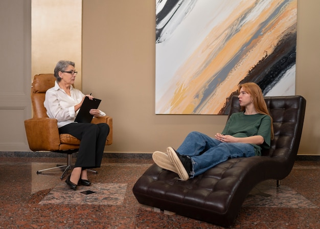 authentic scene of young person undergoing psychological therapy