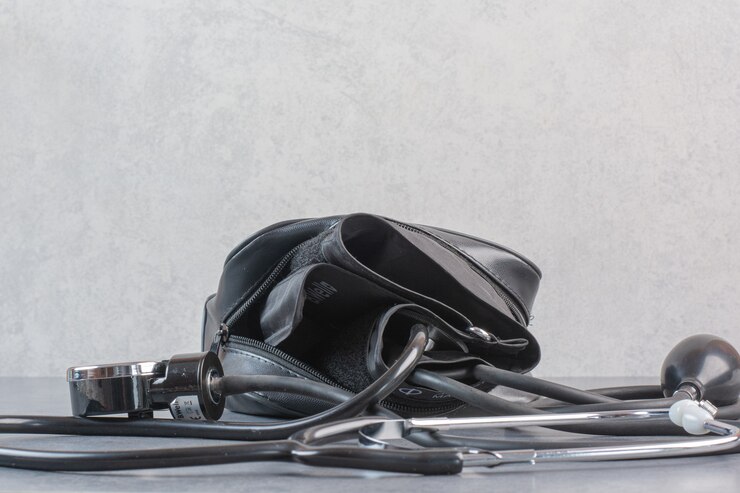 Zdarma Fotografie blood pressure meter and stethoscope on marble table.
